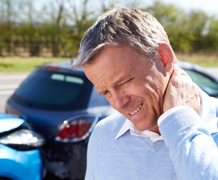 Man with neck pain after car accident