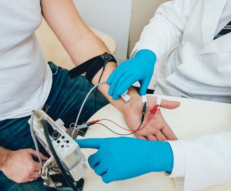 Man receiving Electrodiagnostic testing