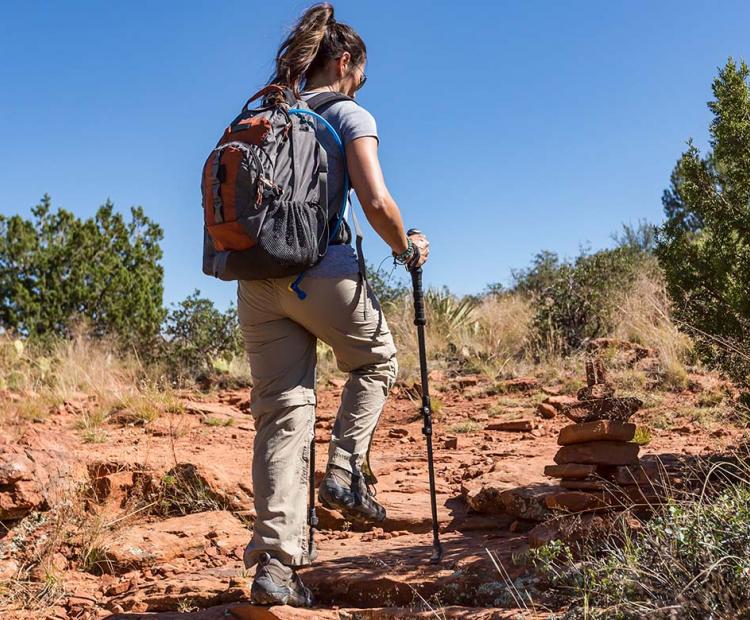 Woman hiking in desert landscape