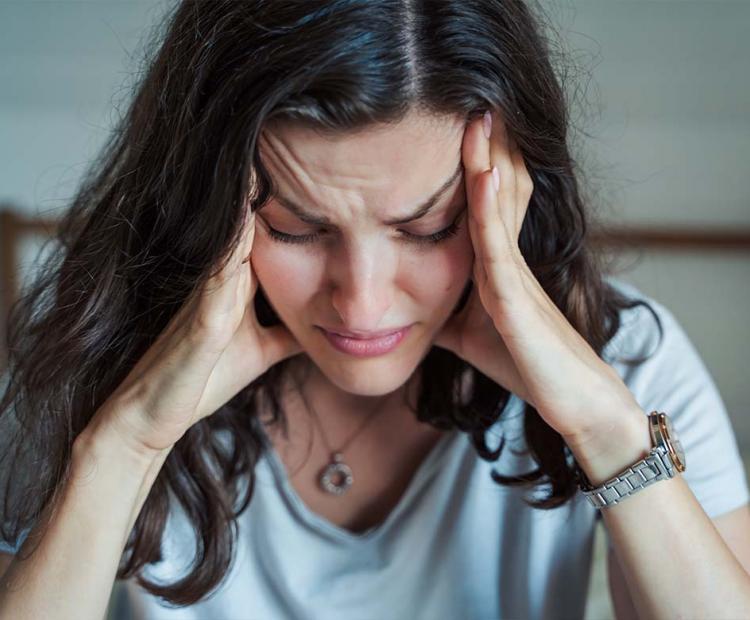 Woman experiencing brain fog