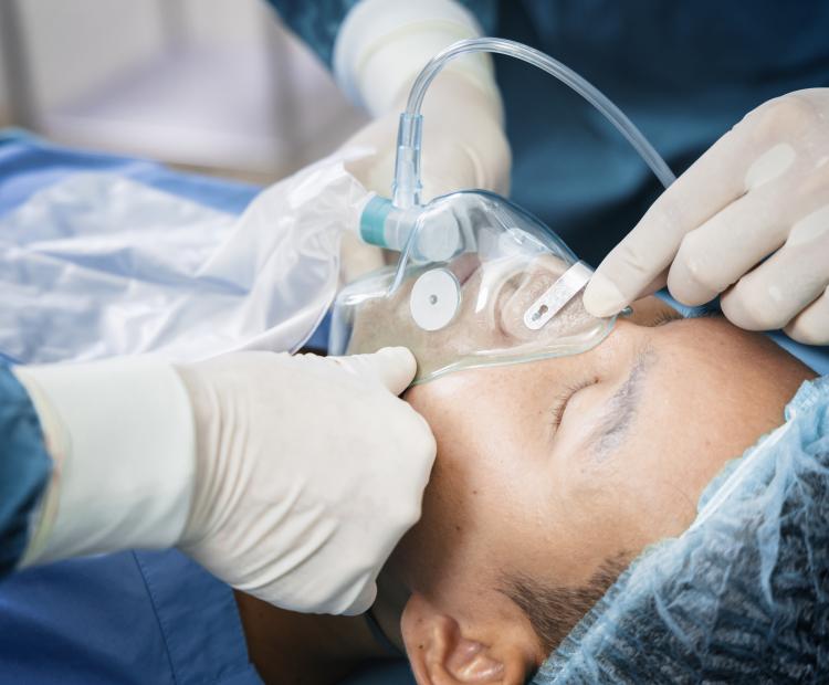 Patient being put under anesthesia before a procedure. 