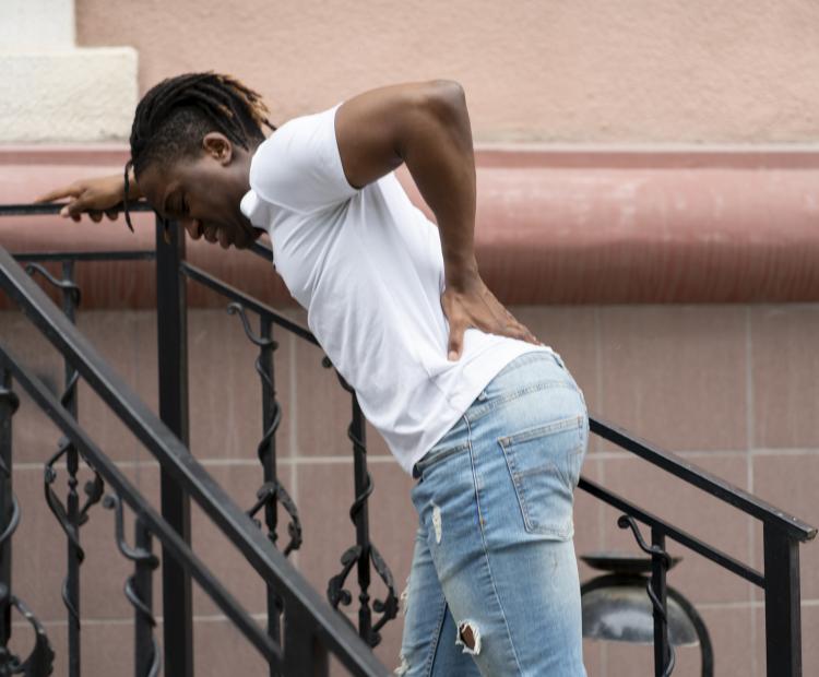 A man with back pain.
