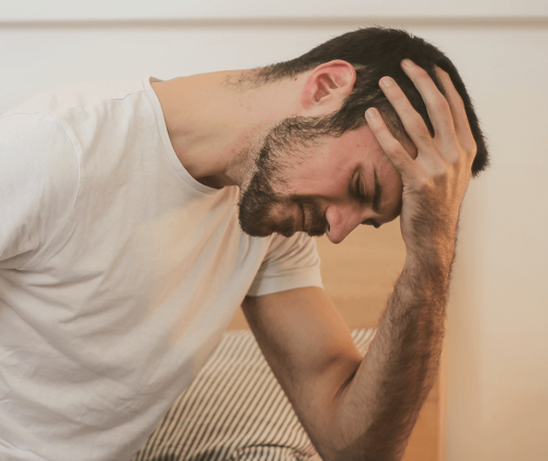 Man in pain with a migraine
