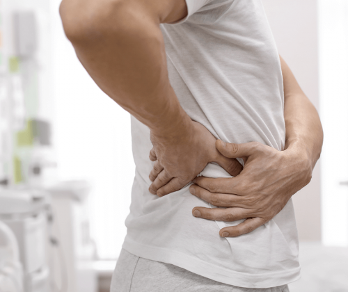 man in pain holding side