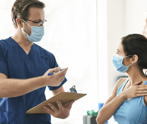 Doctor speaking with patient