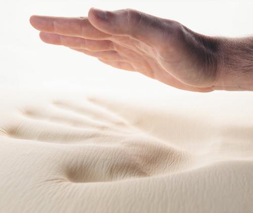 Handprint left on memory foam mattress