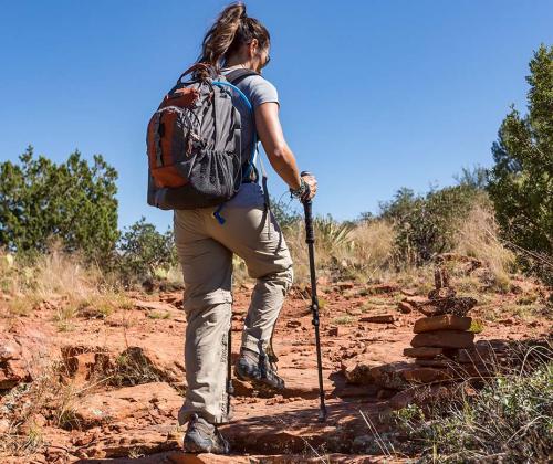 Woman hiking in desert landscape
