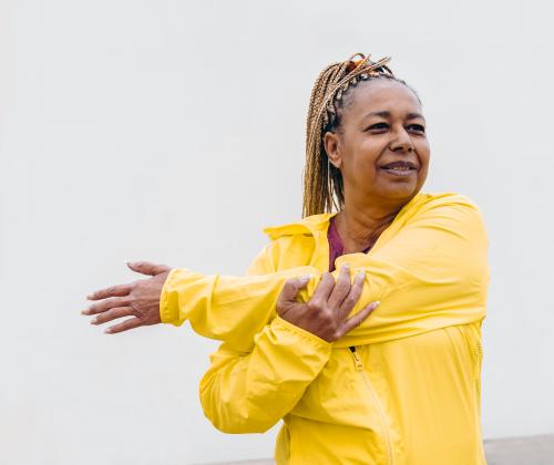 Woman doing a workout to stay healthy after a spinal injection.
