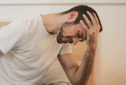 Man in pain with a migraine