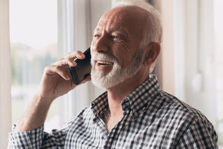 Senior man speaking on a cell phone