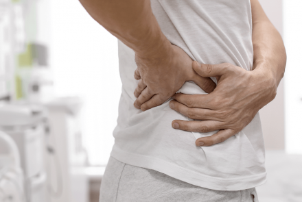 Man with cramp in lower back