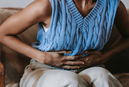 Woman with stomach pain