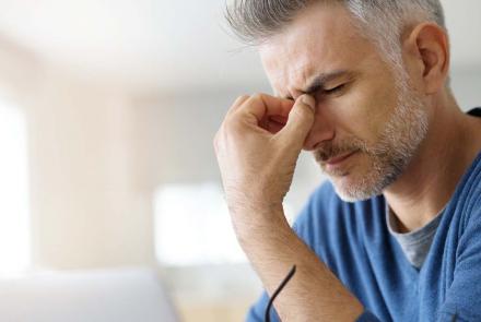Man with a migraine