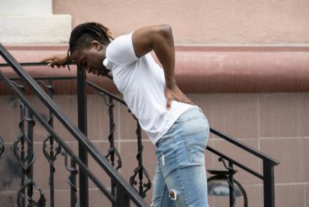 A man with back pain.